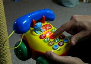 How to get the baby phone toy to curse